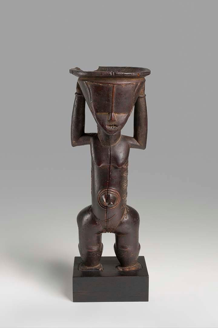 Standing Figure with Bowl on Head
